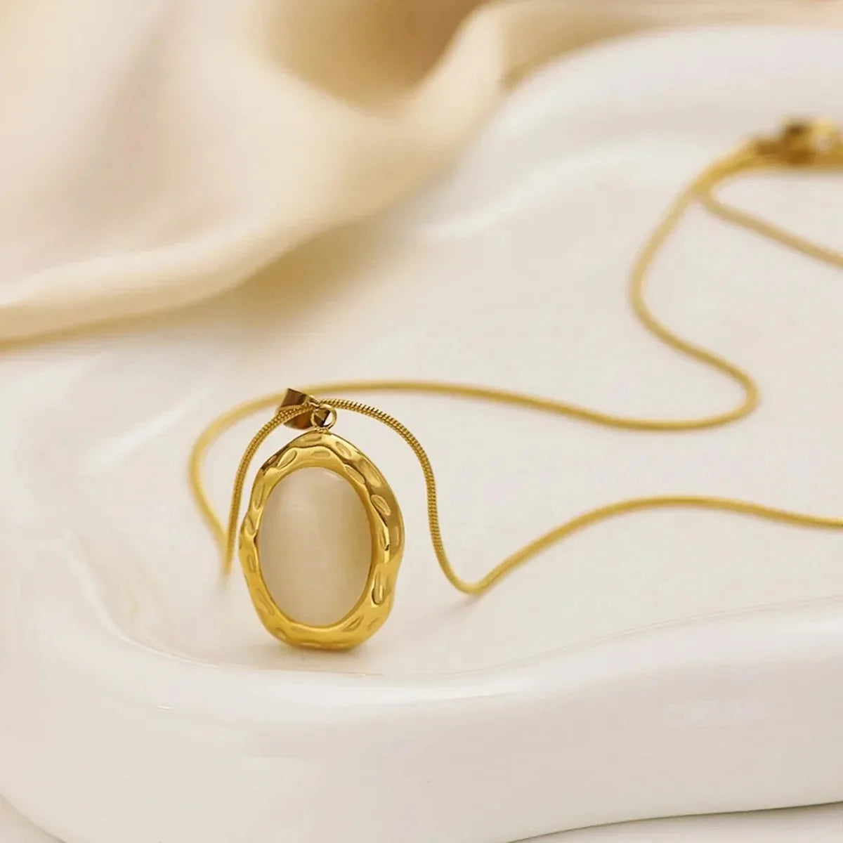 Gold-Tone Necklace with Oval Cat's Eye Opal
